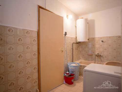 Paks, építők útja, 132 m2 (br 187 m2)-es lakás saját telekkel